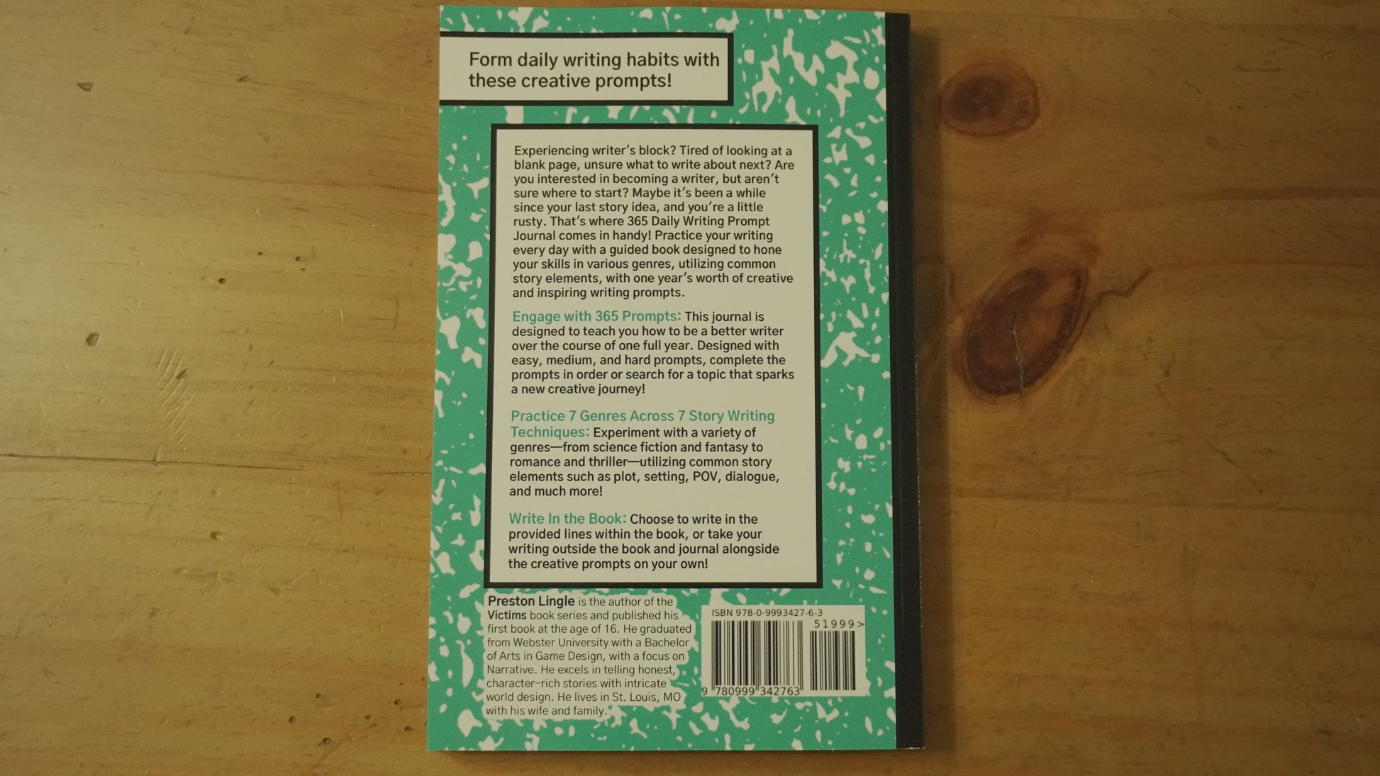 Book back cover with text on a wooden surface